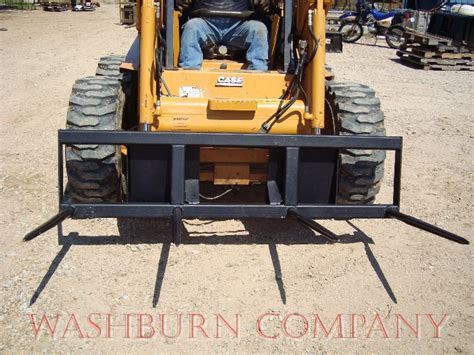 skid steer round bale spear|hay forks for skid steer.